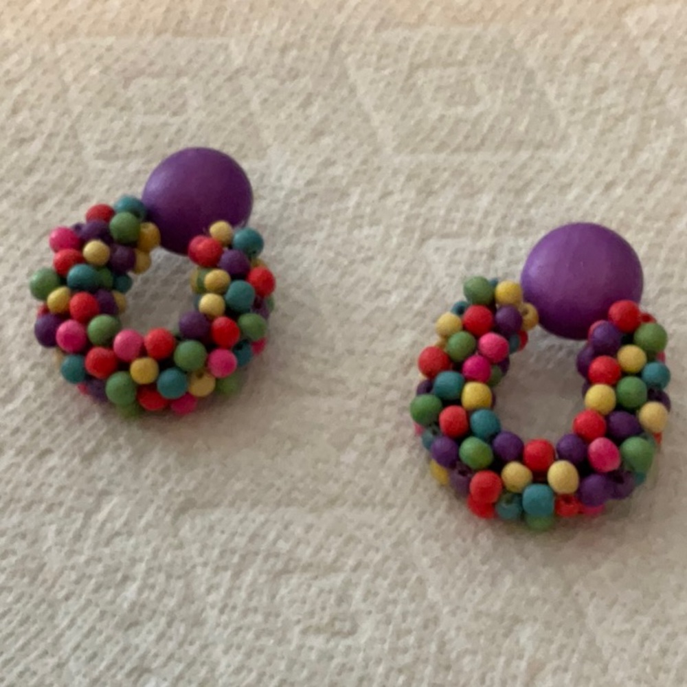 Colorful pierced wooden earrings. Excellent condition and never worn.